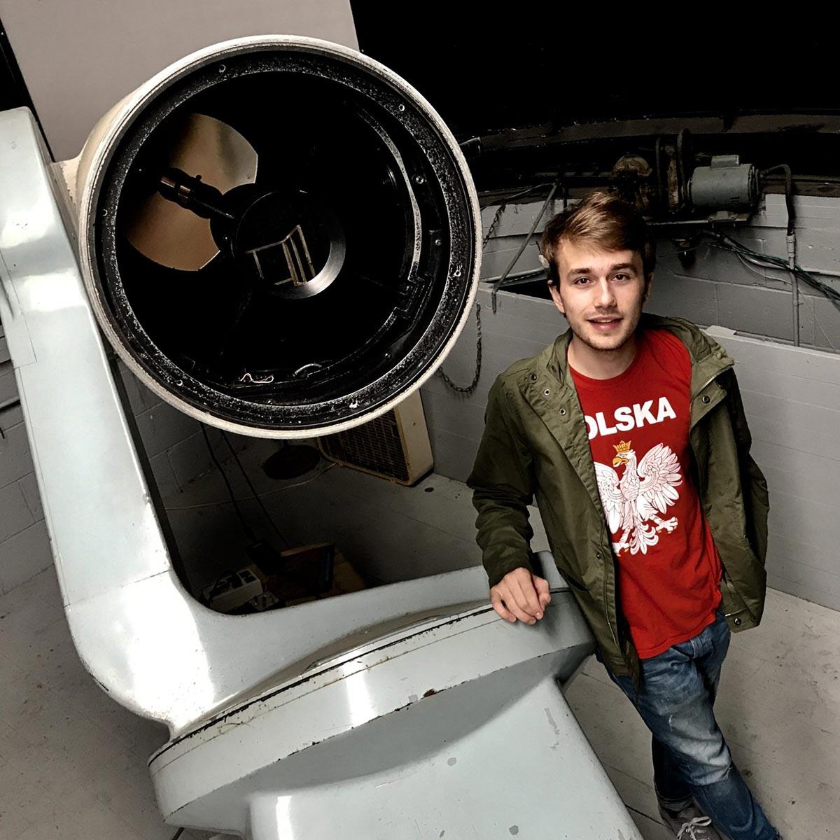 Jacob Pilawa 鈥�20 with the telescope at Colgate's Foggy Bottom Observatory